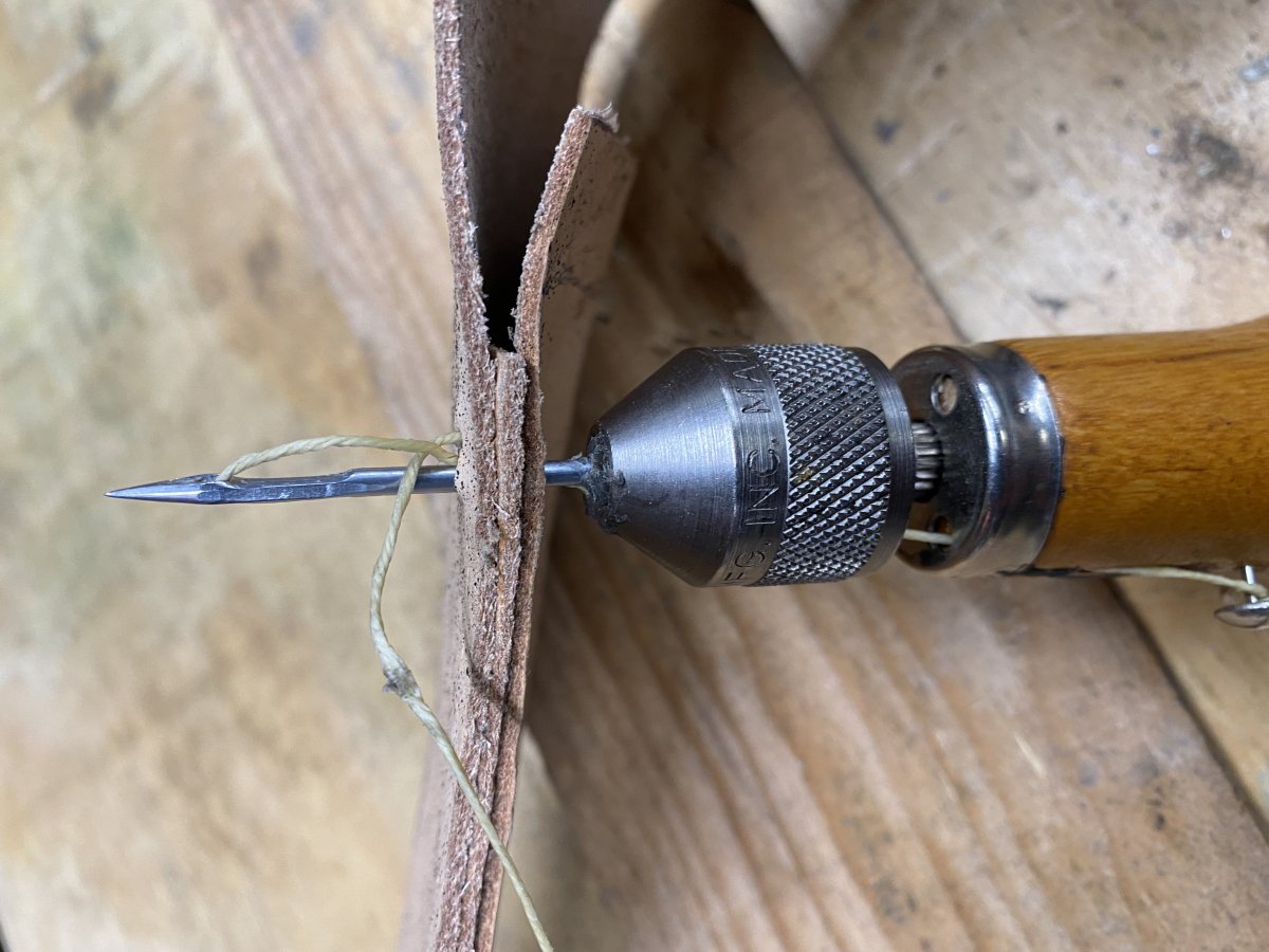 The welt can be seen here between the front and back leather pieces.